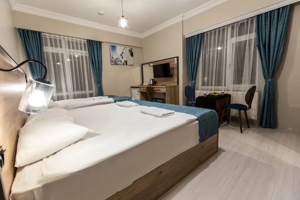Luxury Üç Kişilik Oda
