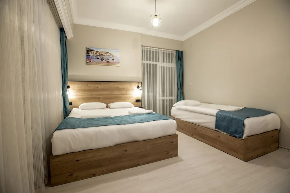 Luxury Üç Kişilik Oda