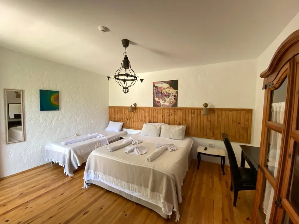 Deluxe Üç Kişilik Oda