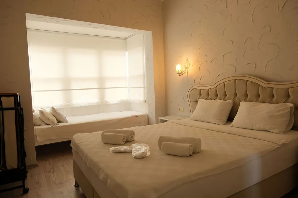 Economy Üç Kişilik Oda (Pellicano)