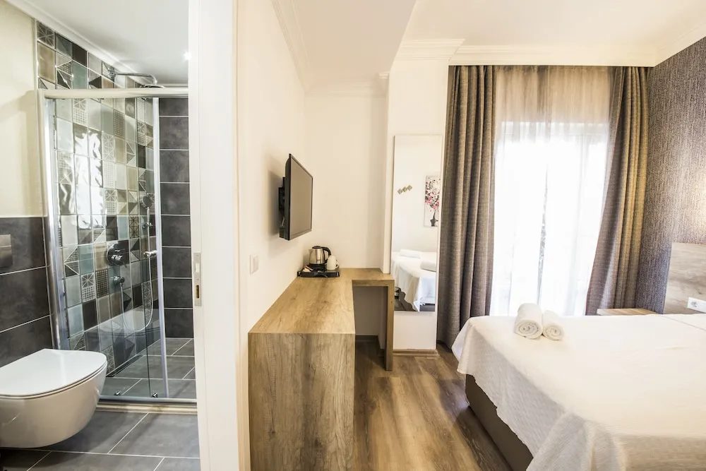 Deluxe İki Ayrı Yataklı Oda, Balkon, Bahçe Manzaralı (Tria)