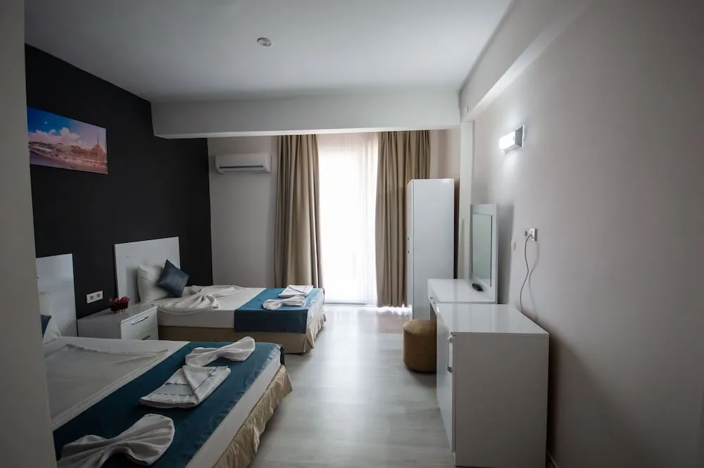 Economy Üç Kişilik Oda