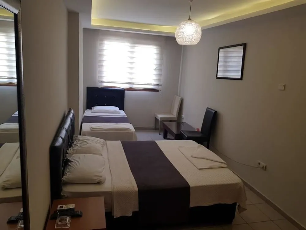 Üç Kişilik Oda