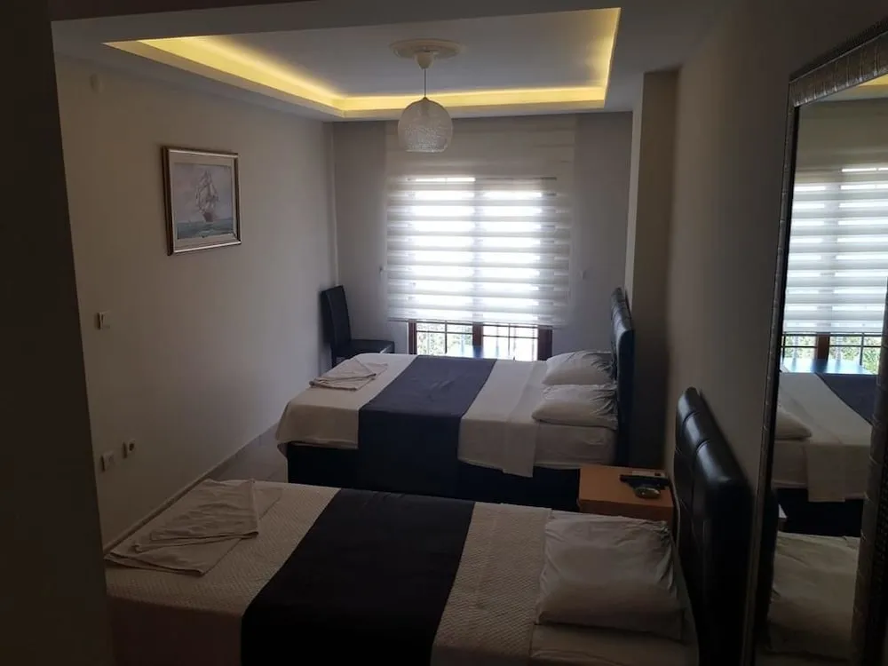 Üç Kişilik Oda