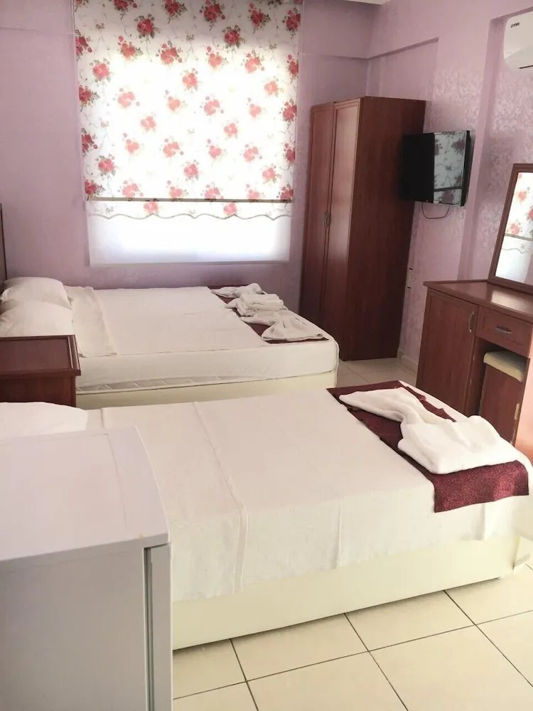 Üç Kişilik Oda