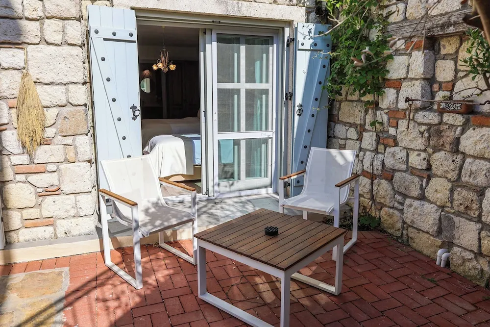 Deluxe Üç Kişilik Oda, Bahçe Manzaralı