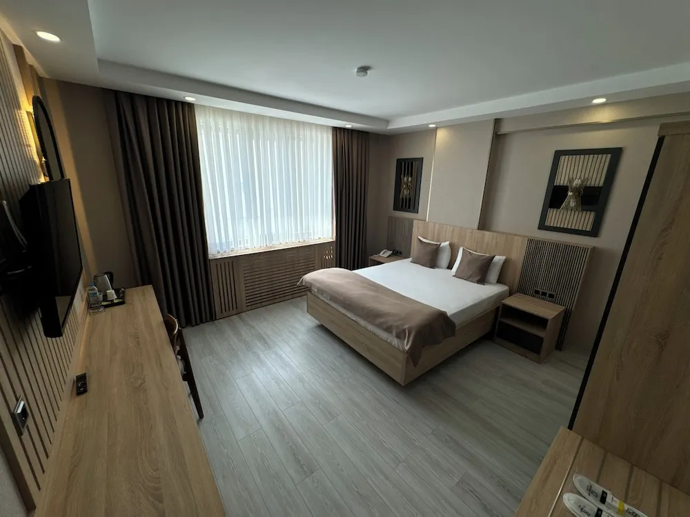 Deluxe Tek Büyük Yataklı Oda