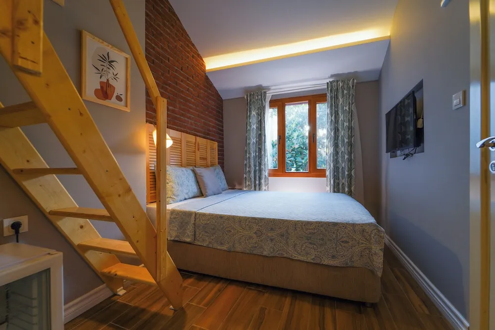 Deluxe Üç Kişilik Oda