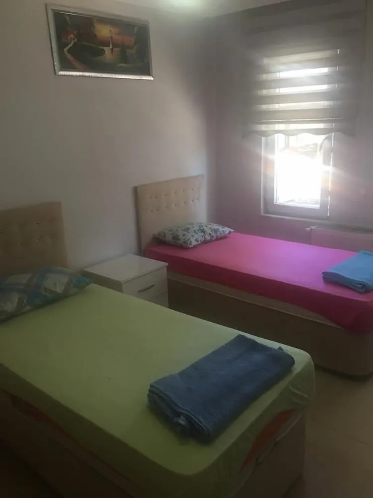 Üç Kişilik Oda