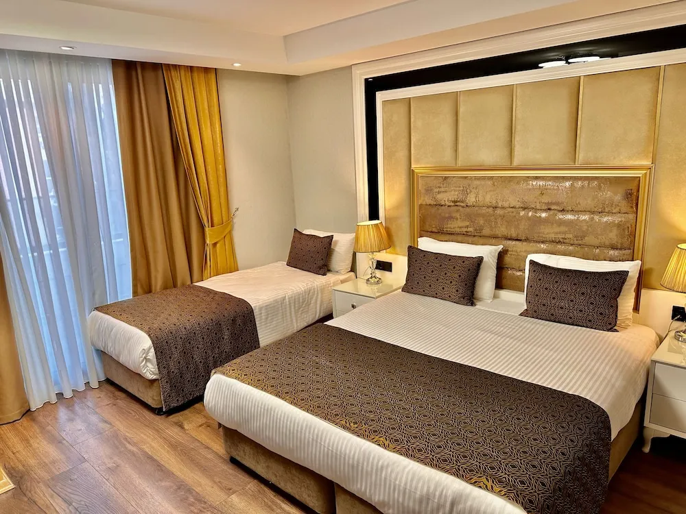 Superior Triple Room with Balcony
