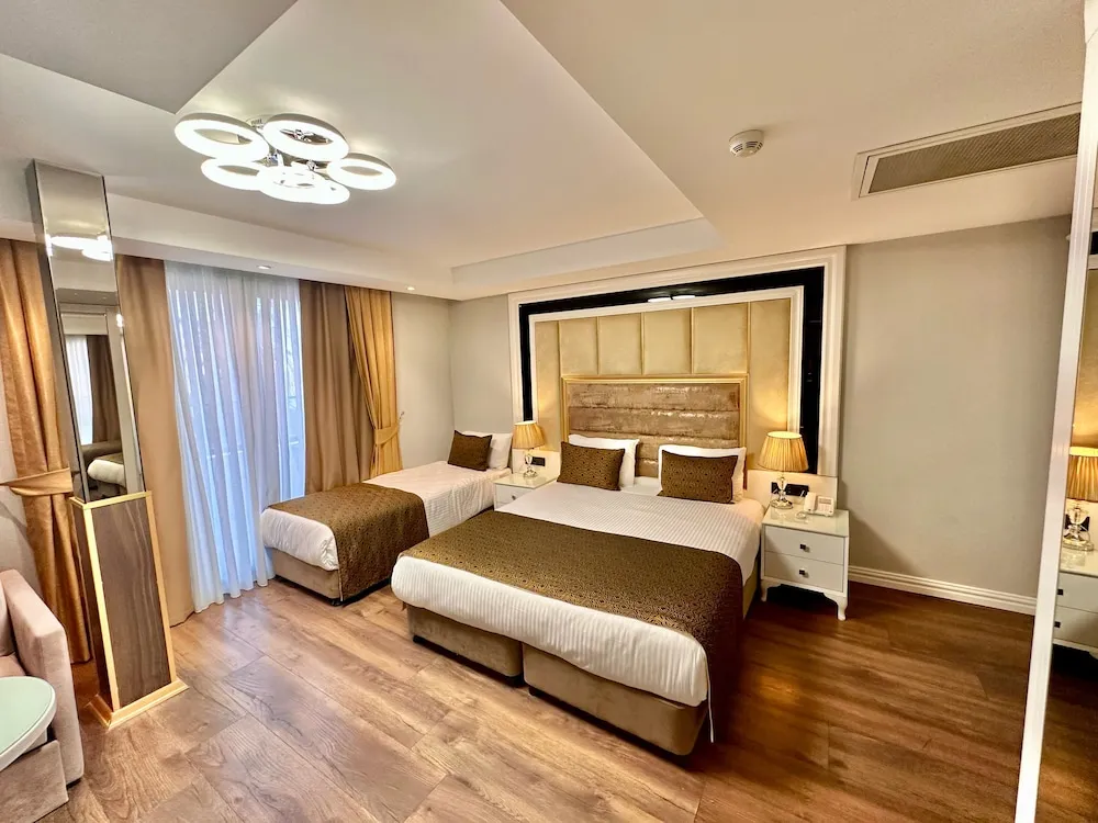 Superior Triple Room with Balcony