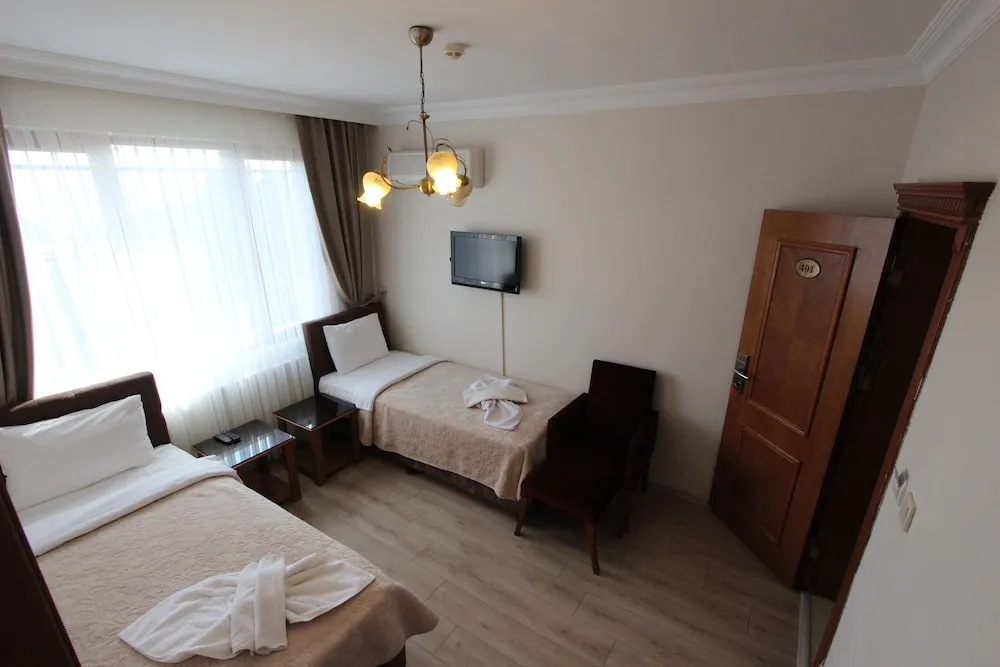 Deluxe Dört Kişilik Oda