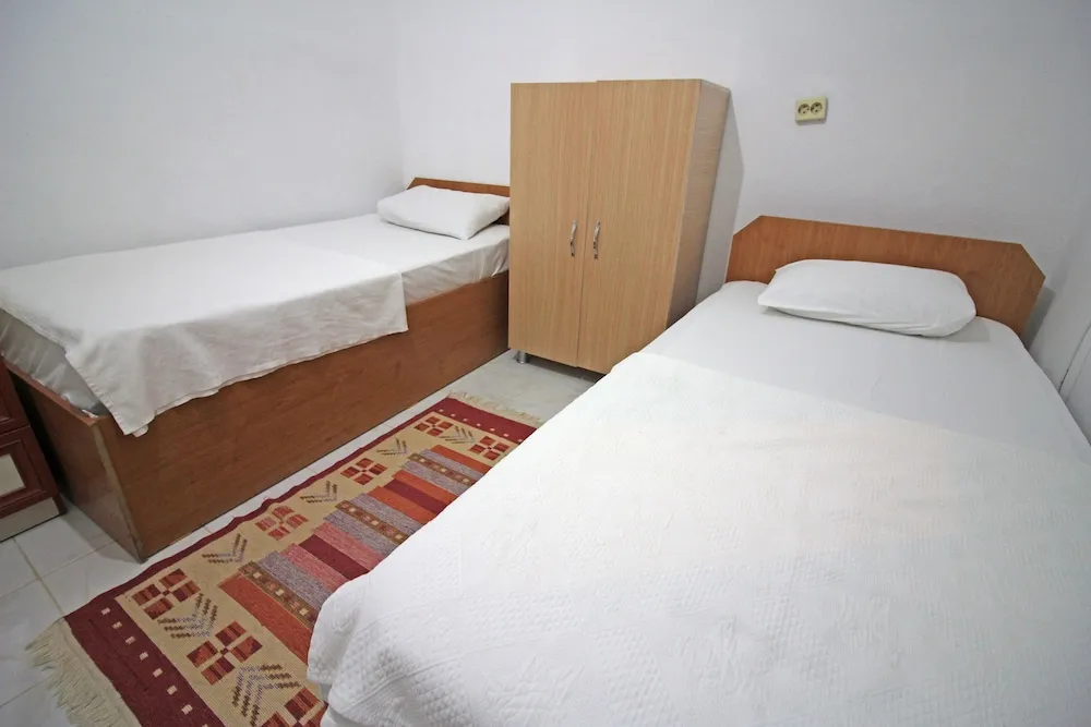 Economy Üç Kişilik Oda