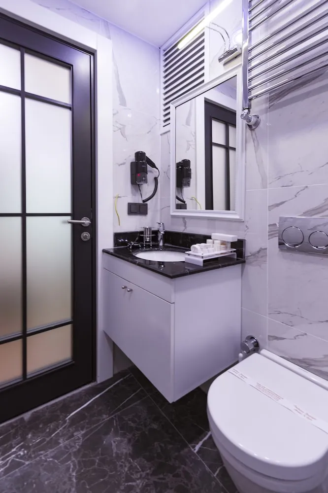 Deluxe Tek Büyük veya İki Ayrı Yataklı Oda, Köşe