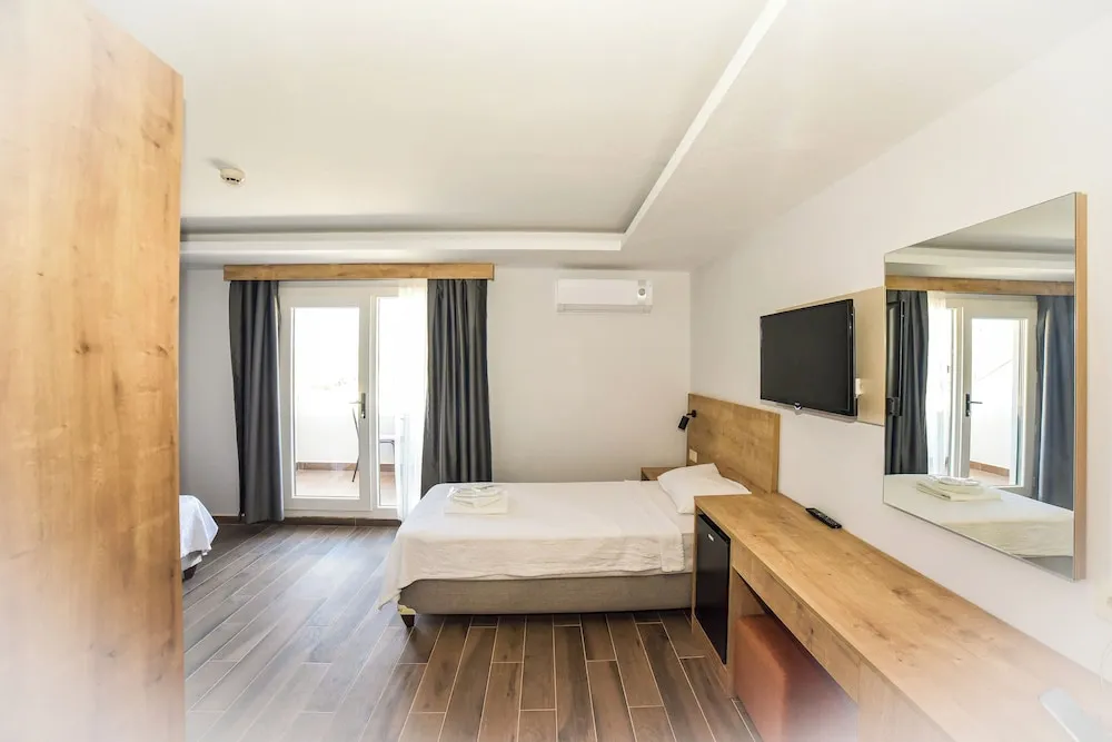 Deluxe Üç Kişilik Oda