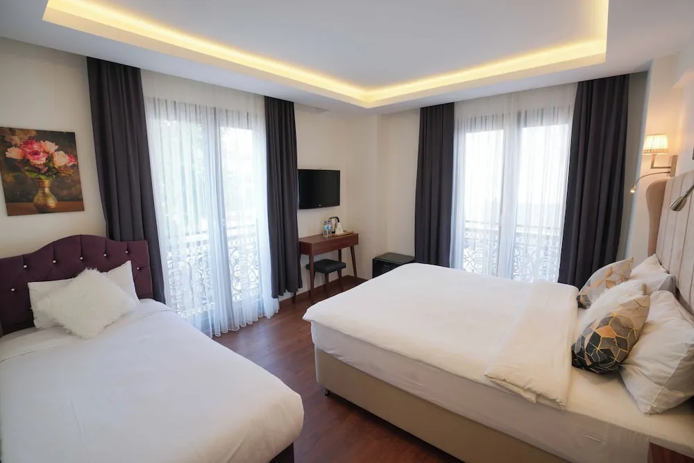Deluxe Triple Room