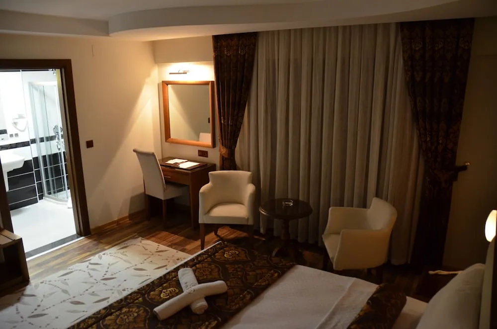 Deluxe Üç Kişilik Oda
