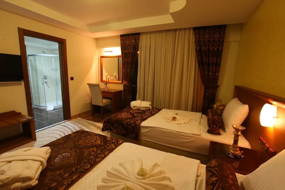 Deluxe Üç Kişilik Oda