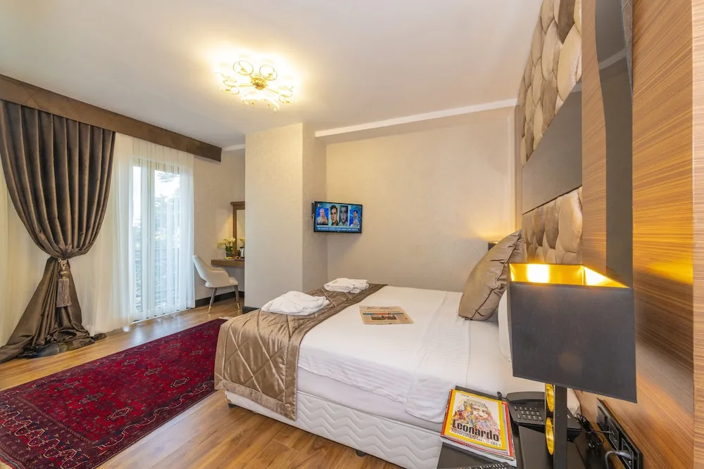 Deluxe Tek Büyük veya İki Ayrı Yataklı Oda