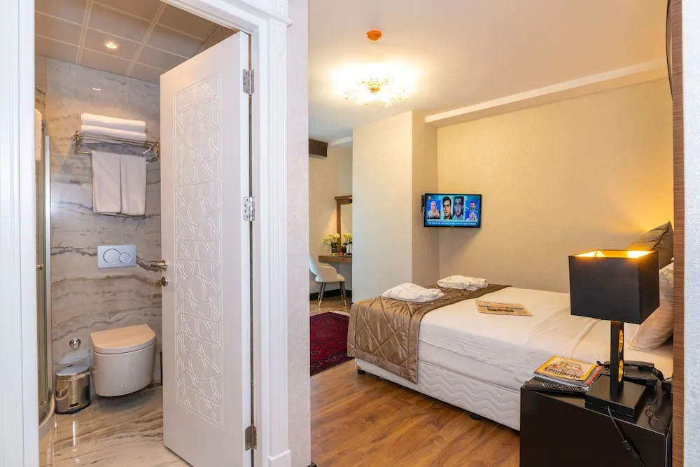 Deluxe Tek Büyük veya İki Ayrı Yataklı Oda