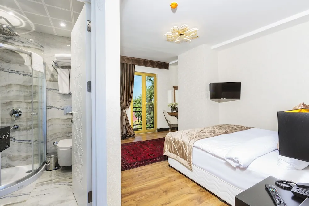 Deluxe Tek Büyük veya İki Ayrı Yataklı Oda