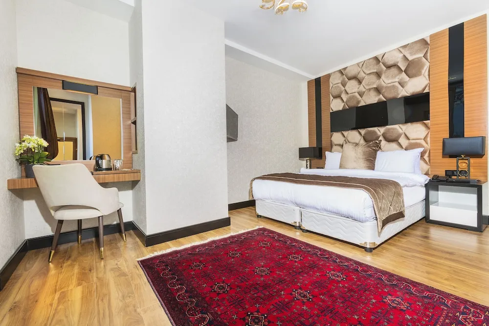 Deluxe Tek Büyük veya İki Ayrı Yataklı Oda