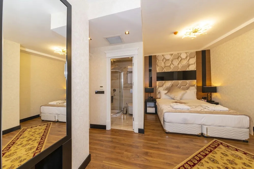 Deluxe Tek Büyük veya İki Ayrı Yataklı Oda