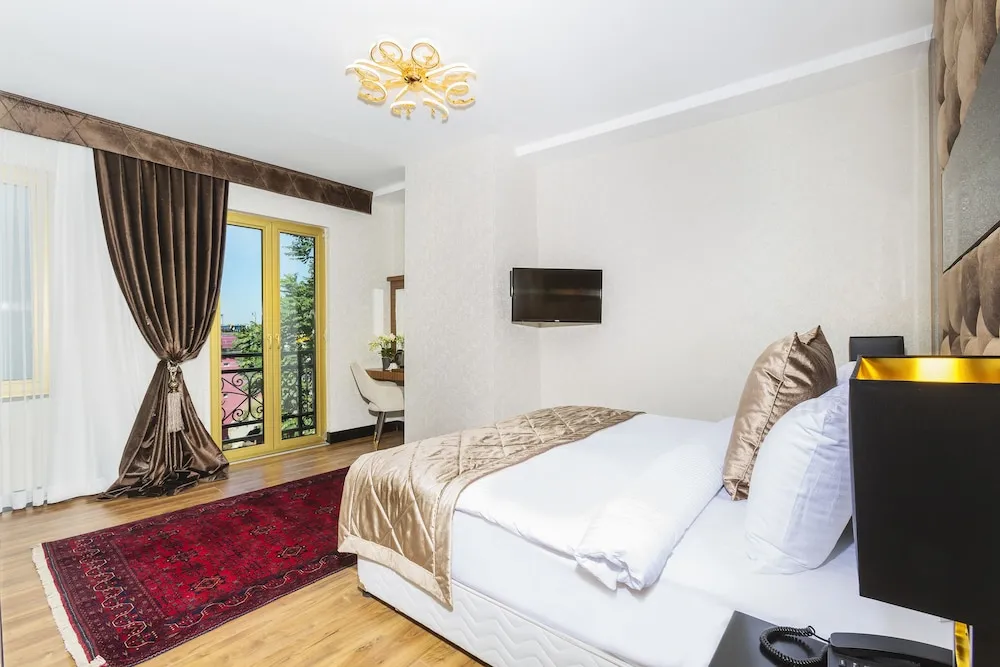 Deluxe Tek Büyük veya İki Ayrı Yataklı Oda