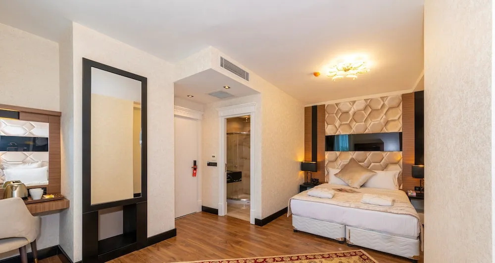 Deluxe Tek Büyük veya İki Ayrı Yataklı Oda