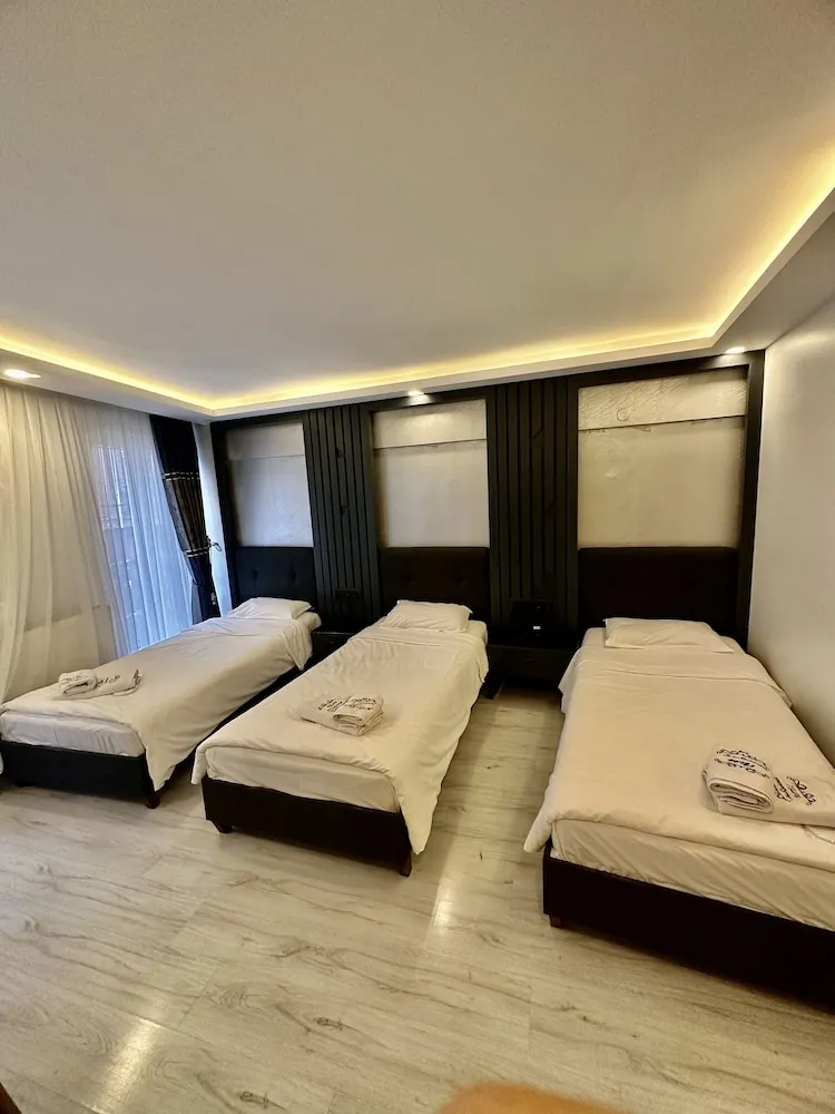 Üç Kişilik Oda