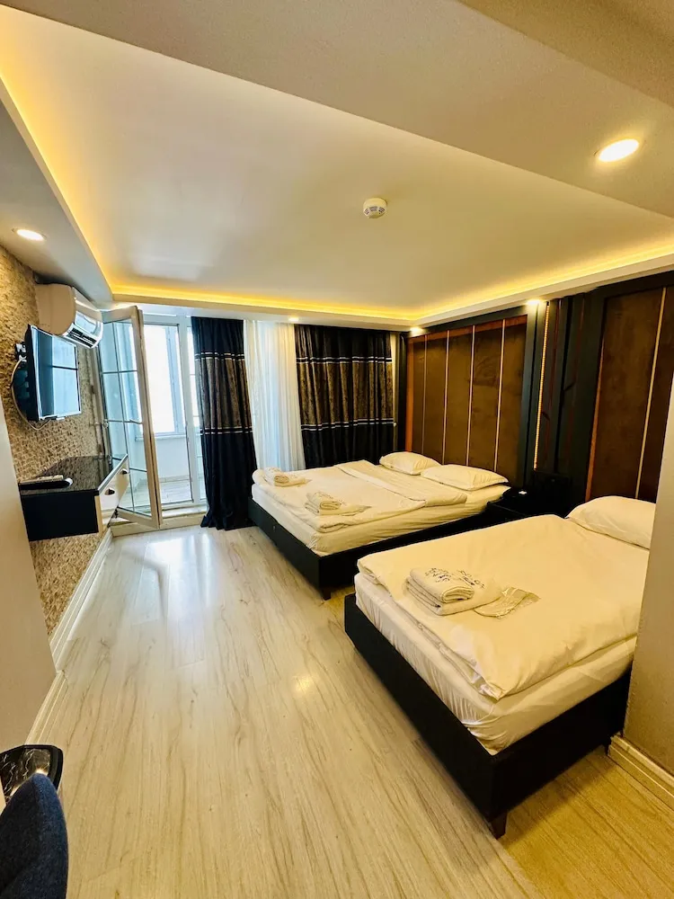 Deluxe Üç Kişilik Oda
