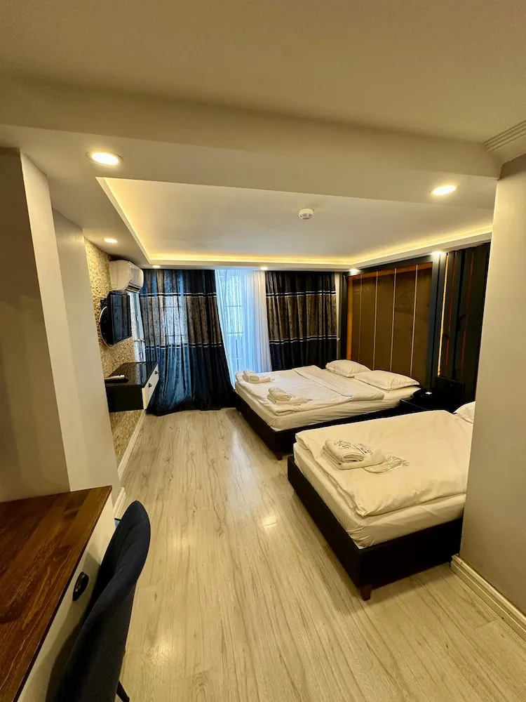 Deluxe Üç Kişilik Oda