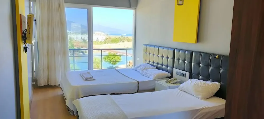 Üç Kişilik Oda