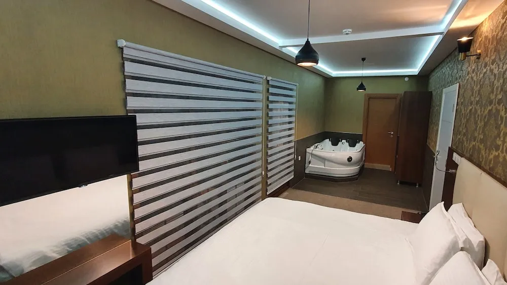 Deluxe Tek Büyük Yataklı Oda, Sıcak Su Küveti