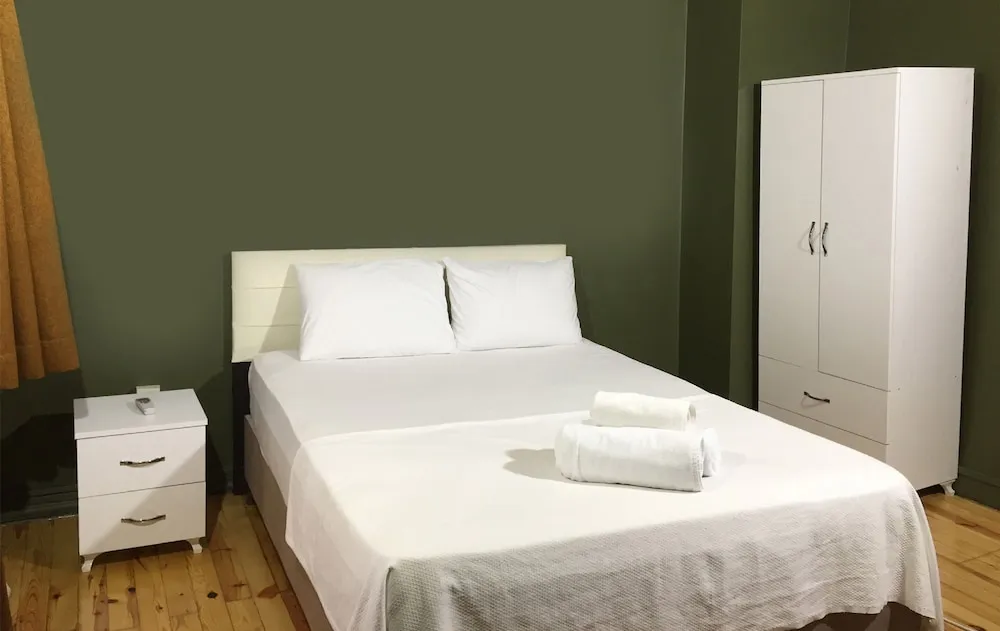 Deluxe Tek Büyük veya İki Ayrı Yataklı Oda