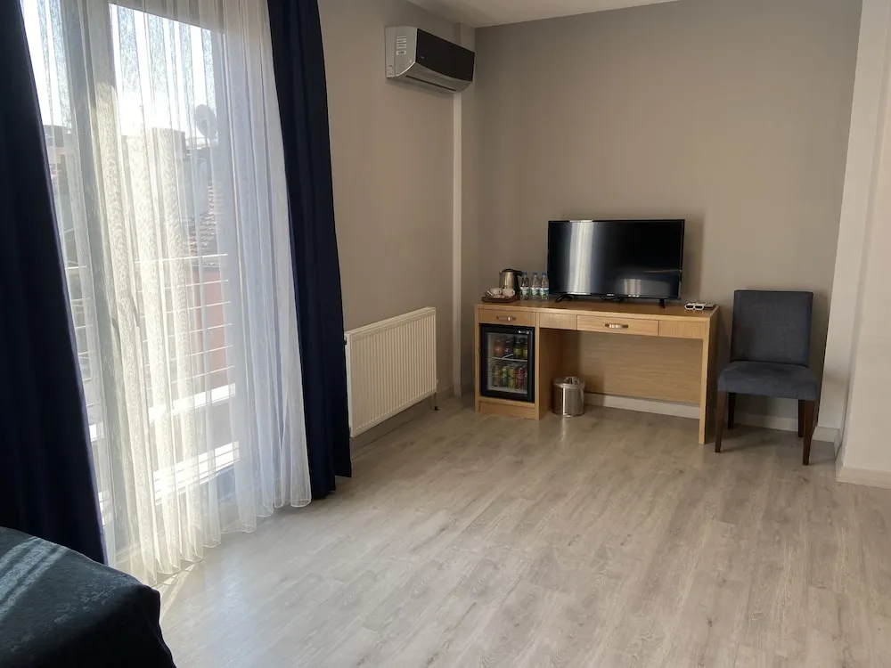 Business Üç Kişilik Oda, 1 Yatak Odası, Balkon/Veranda