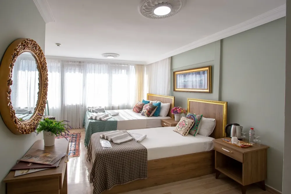 Deluxe Üç Kişilik Oda, Birden Çok Yatak, Deniz Manzaralı