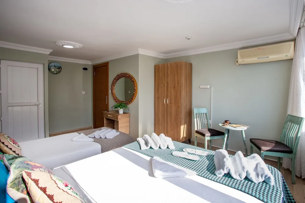 Deluxe Üç Kişilik Oda, Birden Çok Yatak, Deniz Manzaralı