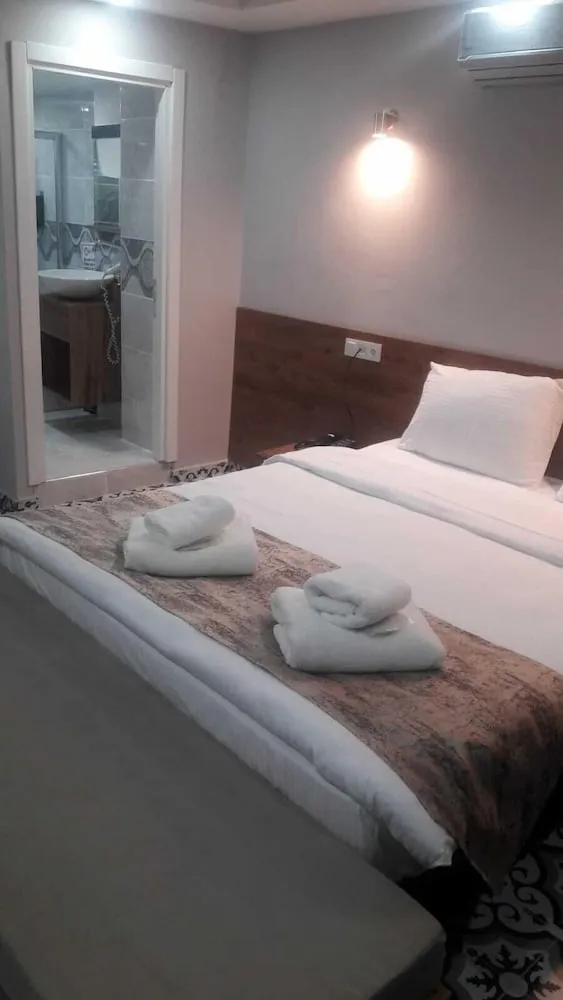 Deluxe Tek Büyük veya İki Ayrı Yataklı Oda