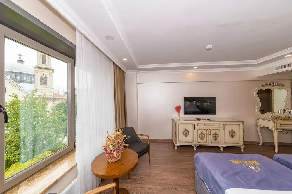 Deluxe Tek Büyük veya İki Ayrı Yataklı Oda