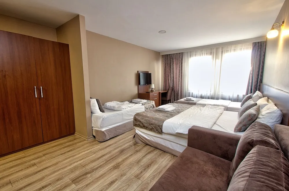 Deluxe Dört Kişilik Oda