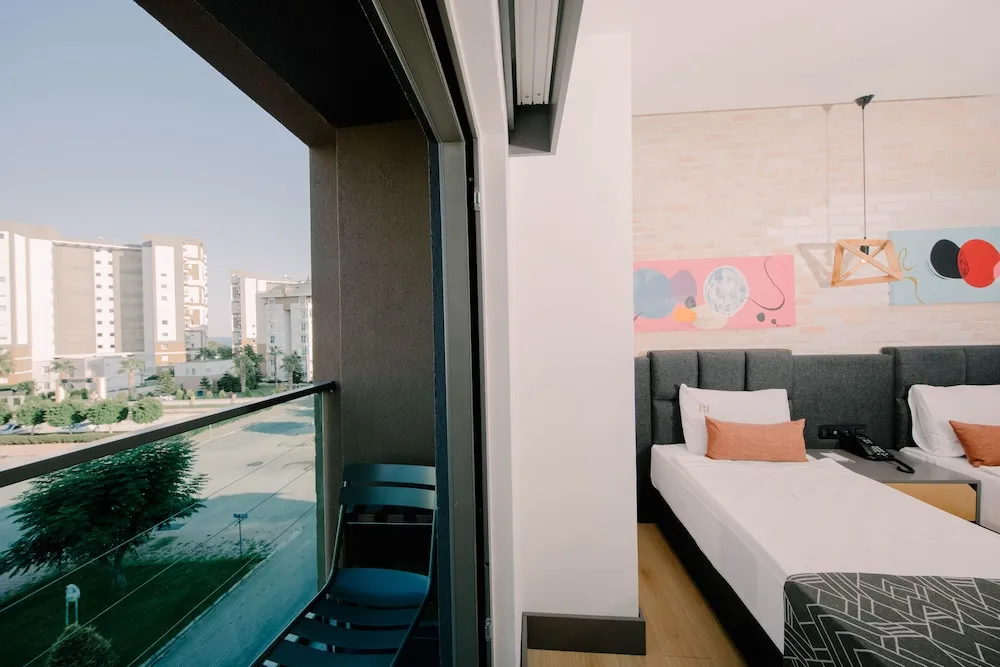 Deluxe Tek Büyük veya İki Ayrı Yataklı Oda
