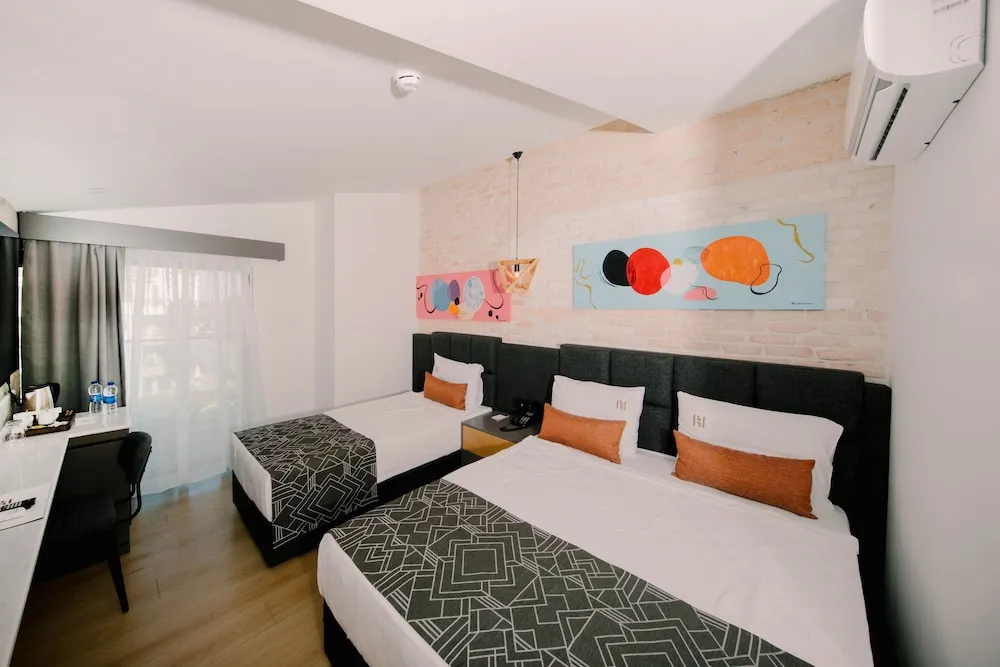 Deluxe Tek Büyük veya İki Ayrı Yataklı Oda