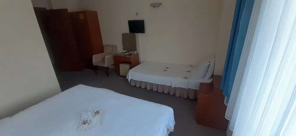 Üç Kişilik Oda