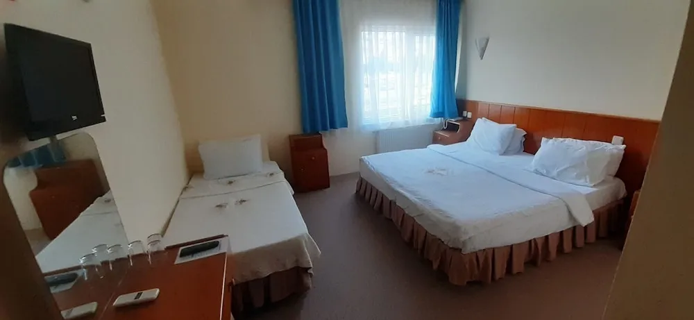 Üç Kişilik Oda