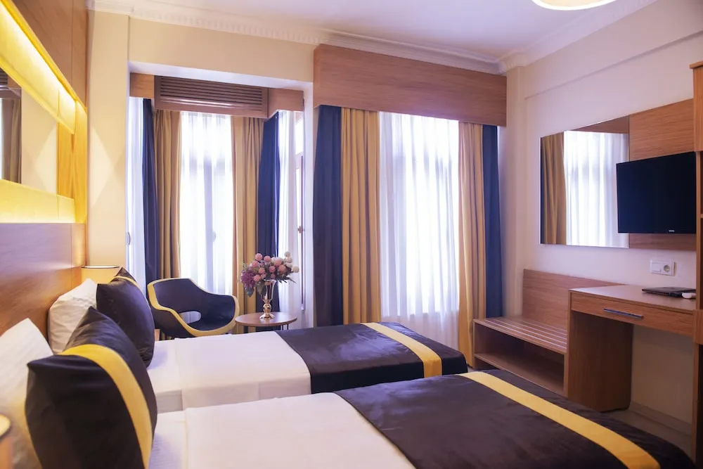 Deluxe Tek Büyük veya İki Ayrı Yataklı Oda