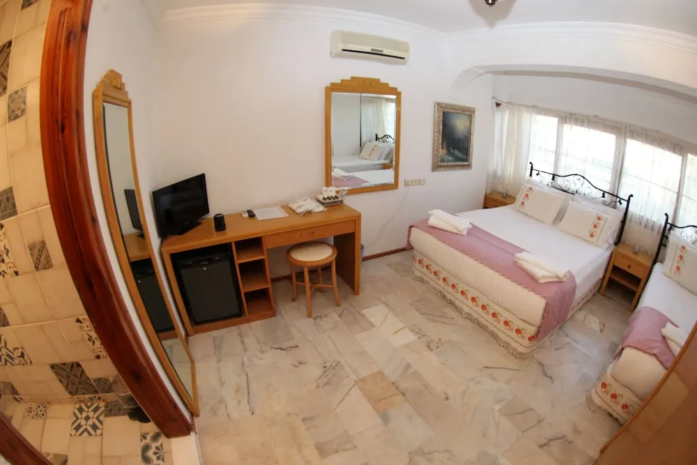 Family Üç Kişilik Oda