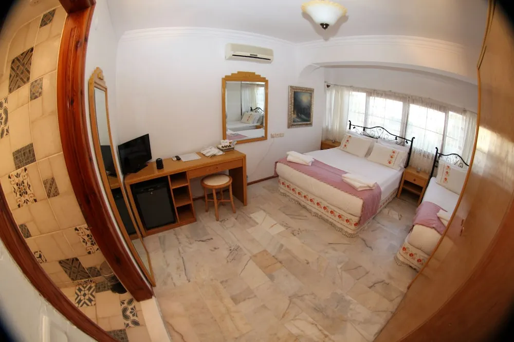 Family Üç Kişilik Oda