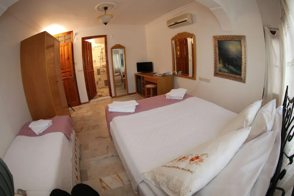 Family Üç Kişilik Oda