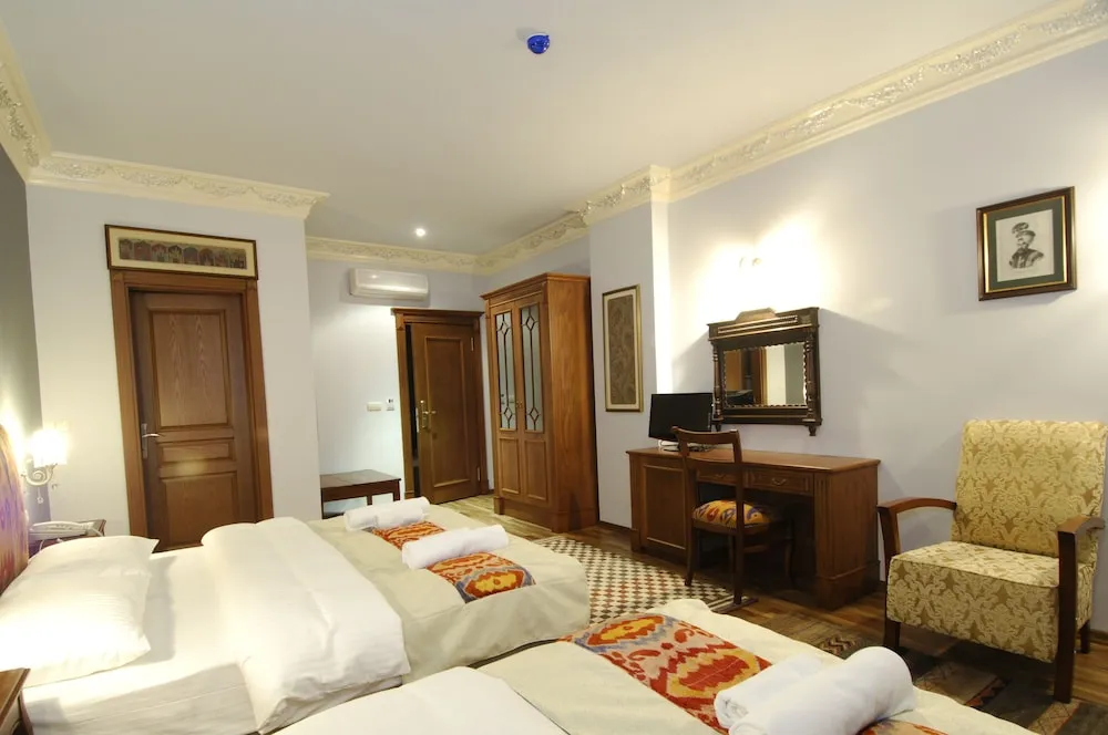 Deluxe Üç Kişilik Oda